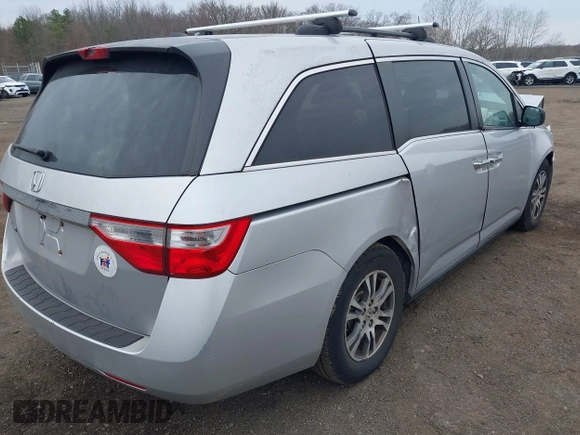 2013 Honda Odyssey EX-L with VIN 5FNRL5H65DB050789, listed as a IAAI auction lot 41911537 with 160,348 mi miles and . Bid and sale history available at carsss.com. Image 17.