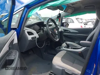 2019 Chevrolet Bolt EV LT z VIN 1G1FY6S02K4135178, wystawiony jako IAAI lot #42419494 z przebiegiem 60 115 mil mil oraz . Historia ofert i sprzedaży dostępna na DreamBid. Obrazek 5.