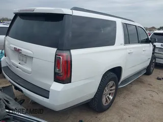 2015 GMC Yukon XL SLT with VIN 1GKS1HKCXFR652337, listed as a IAAI auction lot 41330287 with 139,268 mi miles. Bid and sale history available at carsss.com. Image 4.