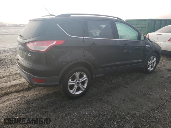 2014 Ford Escape SE with VIN 1FMCU9GX2EUC86115, listed as a Copart auction lot 82810324 with 212,346 mi miles and Salvage Title. Bid and sale history available at DreamBid. Image 3.