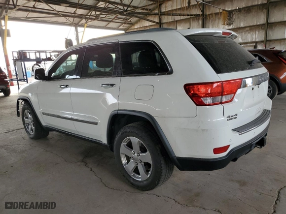 2012 Jeep Grand Cherokee Limited with VIN 1C4RJFBTXCC189998, listed as a Copart auction lot 87547735 with 207,167 mi miles and Salvage Title. Bid and sale history available at carsss.com. Image 2.