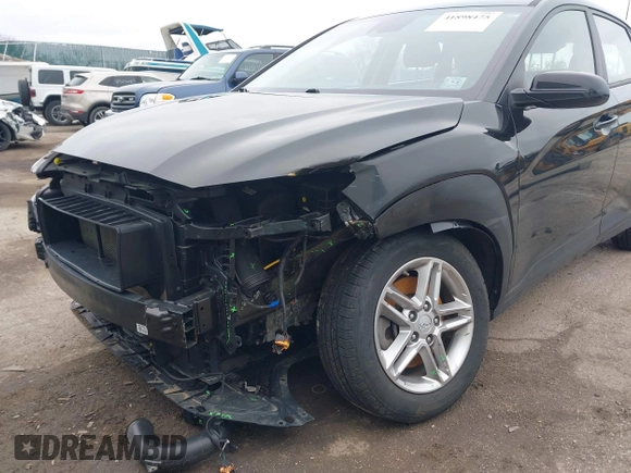 2021 Hyundai Kona SE z VIN KM8K1CAA8MU738427, wystawiony jako IAAI lot #41898475 z przebiegiem 53 112 mil mil oraz . Historia ofert i sprzedaży dostępna na DreamBid. Obrazek 6.