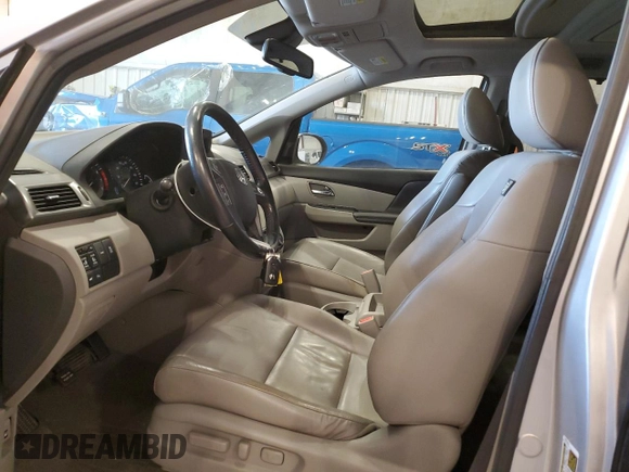 2014 Honda Odyssey Touring with VIN 5FNRL5H97EB005977, listed as a Copart auction lot 53849025 with 229,915 mi miles and Non Repairable. Bid and sale history available at DreamBid. Image 7.