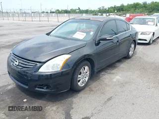 2011 Nissan Altima S with VIN 1N4AL2AP2BN422933, listed as a IAAI auction lot 42615808 with 144,341 mi miles and . Bid and sale history available at DreamBid. Image 2.