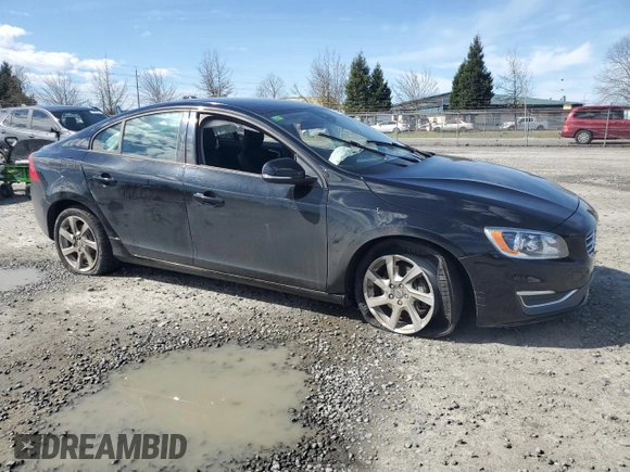 2014 Volvo S60 T5 z VIN YV1612FS0E2295344, wystawiony jako Copart lot #50101125 z przebiegiem 75 959 mil mil oraz Szkody całkowita. Historia ofert i sprzedaży dostępna na DreamBid. Obrazek 4.
