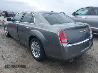 2012 Chrysler 300 Limited with VIN 2C3CCACG4CH308408, listed as a IAAI auction lot 41734589 with 135,813 mi miles. Bid and sale history available at carsss.com. Image 3.