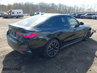 2024 BMW i4 xDrive40 with VIN WBY83FB04RFT19615, listed as a IAAI auction lot 41679918 with 3,883 mi miles. Bid and sale history available at carsss.com. Image 4.