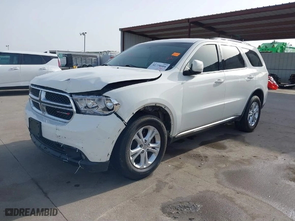2012 Dodge Durango SXT with VIN 1C4RDHAG0CC146763, listed as a IAAI auction lot 41728504 with 216,974 mi miles. Bid and sale history available at carsss.com. Image 2.