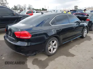 2012 Volkswagen Passat SE with VIN 1VWBP7A31CC047883, listed as a IAAI auction lot 42130138 with 142,017 mi miles. Bid and sale history available at carsss.com. Image 4.