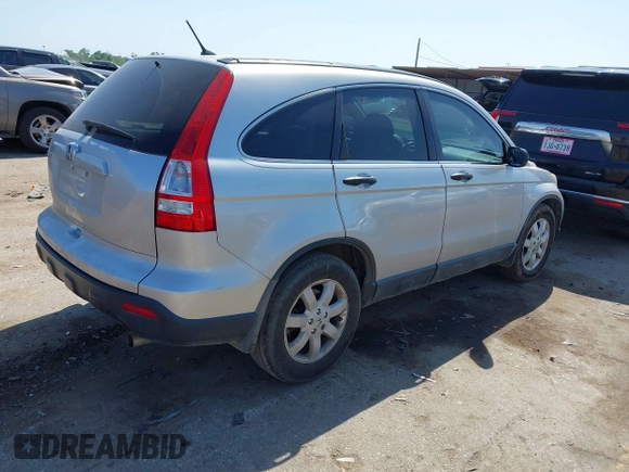 2009 Honda CR-V EX with VIN 3CZRE38559G705051, listed as a IAAI auction lot 42004200 with 185,218 mi miles and . Bid and sale history available at carsss.com. Image 4.