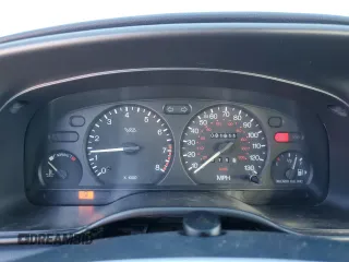 1995 Ford Contour z VIN 1FALP67L8SK186282, wystawiony jako Copart lot #87801845 z przebiegiem 81 611 mil mil oraz Szkody całkowita. Historia ofert i sprzedaży dostępna na DreamBid. Obrazek 9.