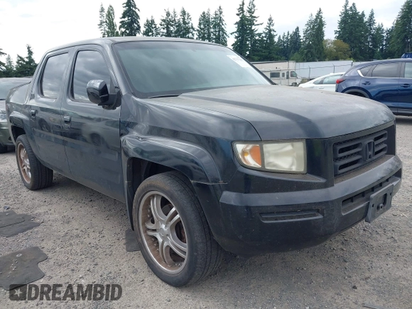 2006 Honda Ridgeline RTL with VIN 2HJYK16526H517466, listed as a IAAI auction lot 42737202 with 184,856 mi miles and . Bid and sale history available at DreamBid. Image 1.