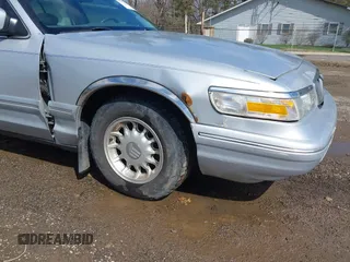 1997 Mercury Grand Marquis LS with VIN 2MELM75W3VX717801, listed as a IAAI auction lot 41920075 with 173,730 mi miles and . Bid and sale history available at DreamBid. Image 18.