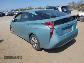 2018 Toyota Prius Two with VIN JTDKBRFU7J3064943, listed as a IAAI auction lot 42077330 with 108,223 mi miles and . Bid and sale history available at carsss.com. Image 3.