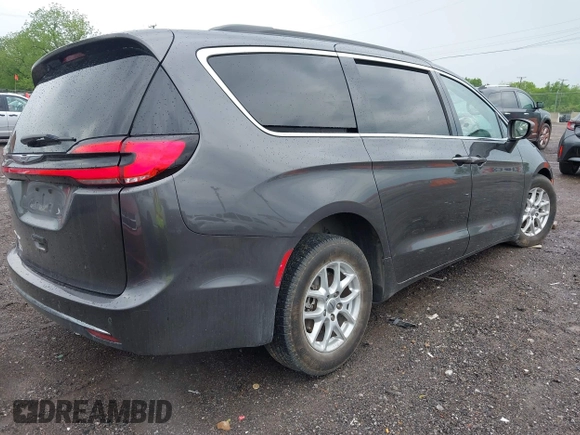 2022 Chrysler Pacifica Touring L with VIN 2C4RC1BG8NR116770, listed as a IAAI auction lot 42093616 with 98,479 mi miles and . Bid and sale history available at DreamBid. Image 4.