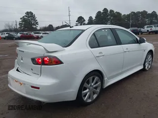 2015 Mitsubishi Lancer GT with VIN JA32U8FW5FU008618, listed as a IAAI auction lot 41290204 with 115,854 mi miles. Bid and sale history available at carsss.com. Image 4.