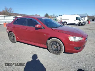 2015 Mitsubishi Lancer ES with VIN JA32U2FU1FU023922, listed as a Copart auction lot 80056044 with 72,880 mi miles and Salvage Title. Bid and sale history available at DreamBid. Image 4.