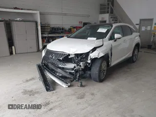 2021 Lexus RX with VIN 2T2JZMDA0MC295323, listed as a IAAI auction lot 42006747 with 45,160 mi miles. Bid and sale history available at carsss.com. Image 2.