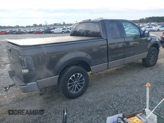 2005 Ford F-150 XLT with VIN 1FTPX12505NB28550, listed as a IAAI auction lot 41381125 with 248,711 mi miles. Bid and sale history available at carsss.com. Image 4.