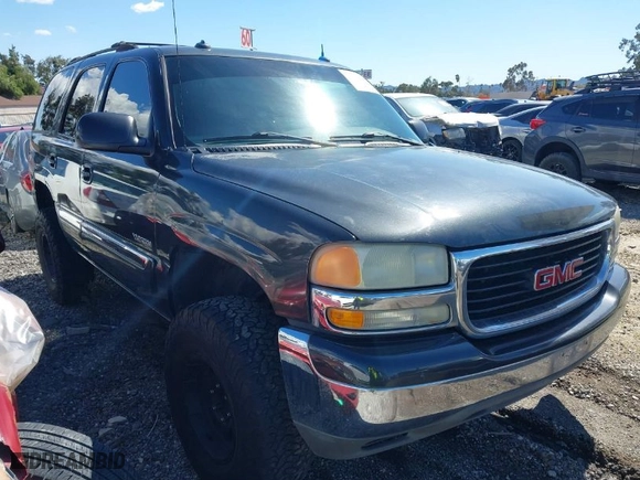 2003 GMC Yukon SLT with VIN 1GKEC13T53R298171, listed as a IAAI auction lot 41738495 with 237,669 mi miles. Bid and sale history available at carsss.com. Image 1.