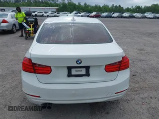 2015 BMW 3 Series 328i with VIN WBA3A5C50FF608327, listed as a IAAI auction lot 42136156 with 213,945 mi miles. Bid and sale history available at carsss.com. Image 16.