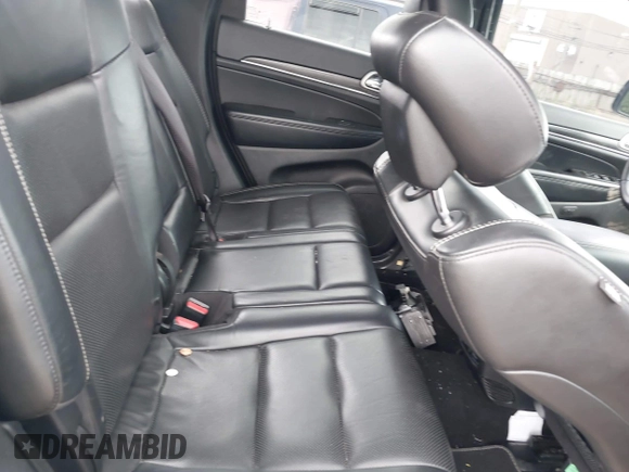 2021 Jeep Grand Cherokee 80th Anniversary with VIN 1C4RJFBG8MC728364, listed as a IAAI auction lot 39803814 with 34,000 mi miles and . Bid and sale history available at DreamBid. Image 8.