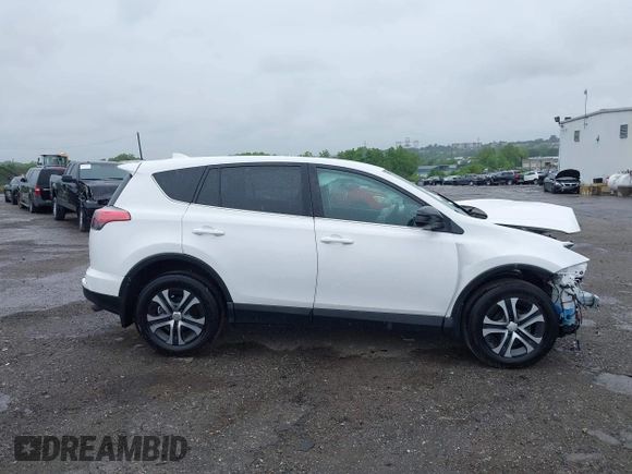 2018 Toyota RAV4 LE with VIN 2T3BFREV7JW851015, listed as a IAAI auction lot 42354042 with 94,603 mi miles and . Bid and sale history available at DreamBid. Image 13.