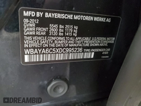 2013 BMW 7 Series 740i with VIN WBAYA6C5XDC995236, listed as a Copart auction lot 41581205 with 121,388 mi miles and Salvage Title. Bid and sale history available at carsss.com. Image 12.