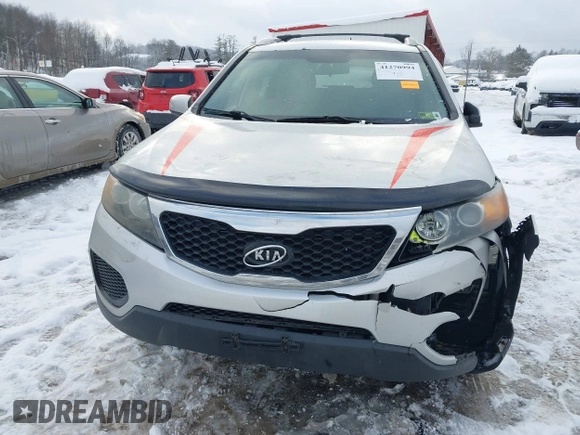2013 Kia Sorento LX with VIN 5XYKTDA26DG338980, listed as a IAAI auction lot 41270994 with 170,714 mi miles. Bid and sale history available at carsss.com. Image 6.