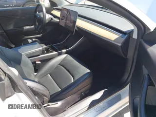 2019 Tesla Model 3 Mid Range with VIN 5YJ3E1EA1KF422983, listed as a IAAI auction lot 41861334 with 53,017 mi miles. Bid and sale history available at carsss.com. Image 5.