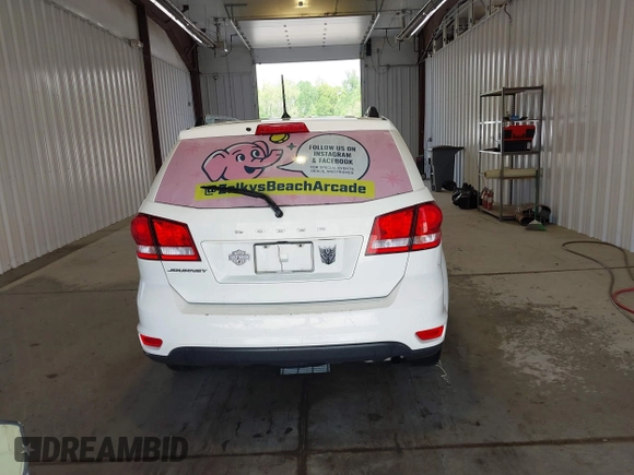 2019 Dodge Journey SE with VIN 3C4PDCBBXKT835029, listed as a IAAI auction lot 42120482 with 130,282 mi miles and . Bid and sale history available at DreamBid. Image 16.