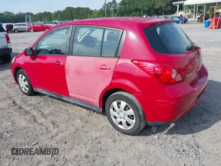 2012 Nissan Versa S with VIN 3N1BC1CP2CL374585, listed as a IAAI auction lot 42209609 with 196,501 mi miles. Bid and sale history available at carsss.com. Image 3.