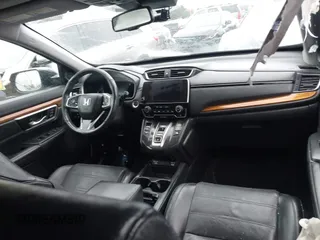 2020 Honda CR-V EX-L with VIN 7FART6H8XLE011609, listed as a IAAI auction lot 41573897 with 95,966 mi miles and . Bid and sale history available at DreamBid. Image 5.
