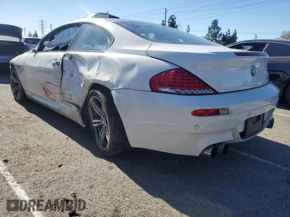 2010 BMW M6 z VIN WBSEH9C52ACY25220, wystawiony jako Copart lot #80767324 z przebiegiem Nie podano mil oraz Szkoda całkowita • Salvage title. Historia ofert i sprzedaży dostępna na DreamBid. Obrazek 2.