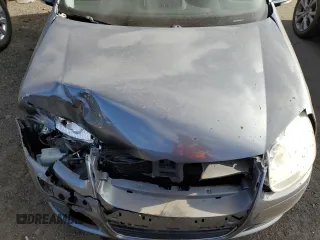 2009 Volkswagen Jetta z VIN 3VWHZ71KX9M011693, wystawiony jako Copart lot #87076904 z przebiegiem 157 478 mil mil oraz Szkoda całkowita • Salvage title. Historia ofert i sprzedaży dostępna na DreamBid. Obrazek 11.