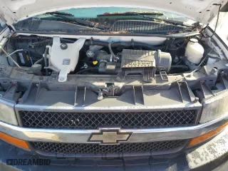 2014 Chevrolet Express Passenger LT with VIN 1GAZG1FG6E1203501, listed as a Copart auction lot 77277784 with 69,312 mi miles and Salvage Title. Bid and sale history available at carsss.com. Image 12.
