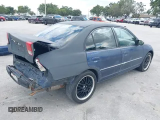 2004 Honda Civic LX with VIN 2HGES16514H602613, listed as a IAAI auction lot 39716121 with 215,401 mi miles and . Bid and sale history available at carsss.com. Image 4.
