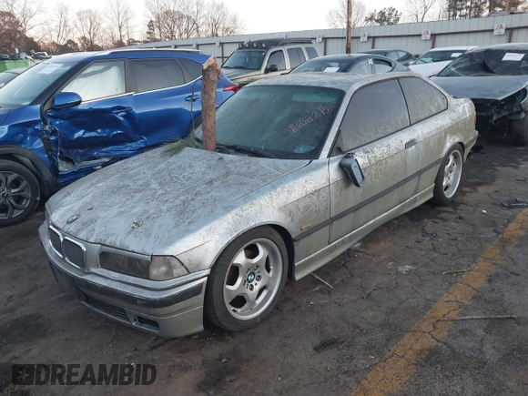 1998 BMW 3 Series 328is with VIN WBABG1329WET06968, listed as a IAAI auction lot 41656215 with 270,000 mi miles. Bid and sale history available at carsss.com. Image 17.