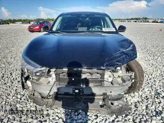 2022 Ford Mustang Mach-E Select with VIN 3FMTK1RM7NMA62546, listed as a Copart auction lot 59795205 with 99,266 mi miles and Salvage title. Bid and sale history available at DreamBid. Image 5.