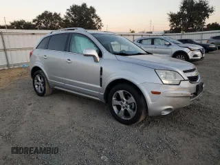 2014 Chevrolet Captiva Sport LT with VIN 3GNAL3EK4ES668589, listed as a Copart auction lot 75056914 with 104,137 mi miles and Salvage Title. Bid and sale history available at DreamBid. Image 4.
