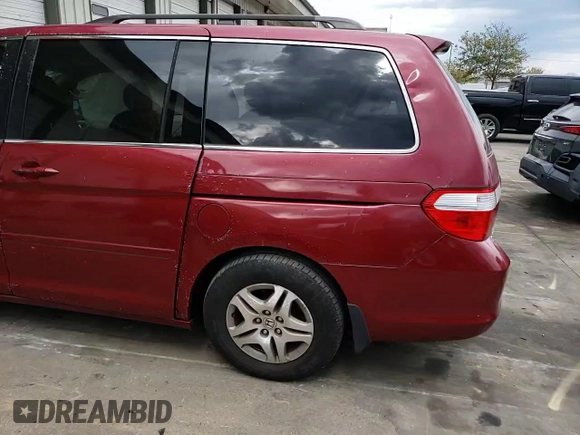 2006 Honda Odyssey EX z VIN 5FNRL38436B058444, wystawiony jako Copart lot #70381084 z przebiegiem 181 928 mil mil oraz Szkoda całkowita • Salvage title. Historia ofert i sprzedaży dostępna na DreamBid. Obrazek 12.