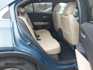 2024 Cadillac XT4 AWD Premium Luxury with VIN 1GYFZDR45RF143981, listed as a IAAI auction lot 42032787 with 14,700 mi miles and . Bid and sale history available at DreamBid. Image 8.