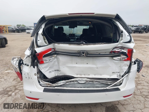 2022 Honda Odyssey Elite z VIN 5FNRL6H96NB039950, wystawiony jako IAAI lot #41907106 z przebiegiem 67 490 mil mil oraz . Historia ofert i sprzedaży dostępna na DreamBid. Obrazek 16.