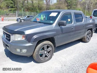 2009 Honda Ridgeline RTL with VIN 2HJYK16539H503533, listed as a IAAI auction lot 42040423 with 206,102 mi miles. Bid and sale history available at carsss.com. Image 2.