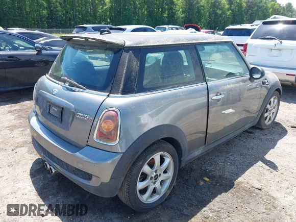 2009 MINI Hardtop S with VIN WMWMF73579TT96047, listed as a IAAI auction lot 42294180 with 109,331 mi miles and . Bid and sale history available at DreamBid. Image 4.