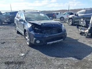 2014 Subaru Outback 3.6R Limited with VIN 4S4BRDPC7E2281601, listed as a IAAI auction lot 41632389 with 99,057 mi miles. Bid and sale history available at carsss.com. Image 1.