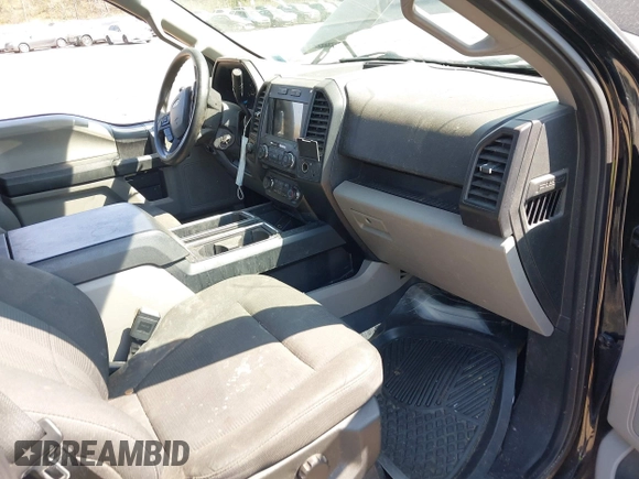 2018 Ford F-150 XL with VIN 1FTEW1EP2JFE13018, listed as a IAAI auction lot 42040276 with 97,563 mi miles. Bid and sale history available at carsss.com. Image 5.