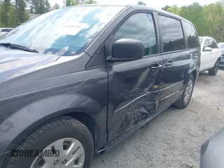 2016 Dodge Grand Caravan SE with VIN 2C4RDGBG2GR345965, listed as a IAAI auction lot 41955192 with 141,531 mi miles and . Bid and sale history available at DreamBid. Image 6.