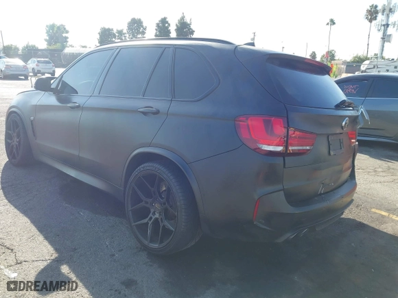 2016 BMW X5 M with VIN 5YMKT6C51G0R79331, listed as a IAAI auction lot 40590865 with 80,772 mi miles. Bid and sale history available at carsss.com. Image 3.