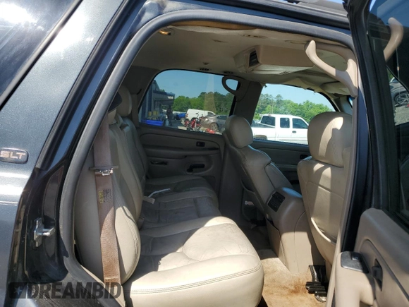 2005 GMC Yukon SLT z VIN 1GKEC13TX5R106956, wystawiony jako Copart lot #52486205 z przebiegiem 317 375 mil mil oraz Szkoda całkowita • Salvage title. Historia ofert i sprzedaży dostępna na DreamBid. Obrazek 11.